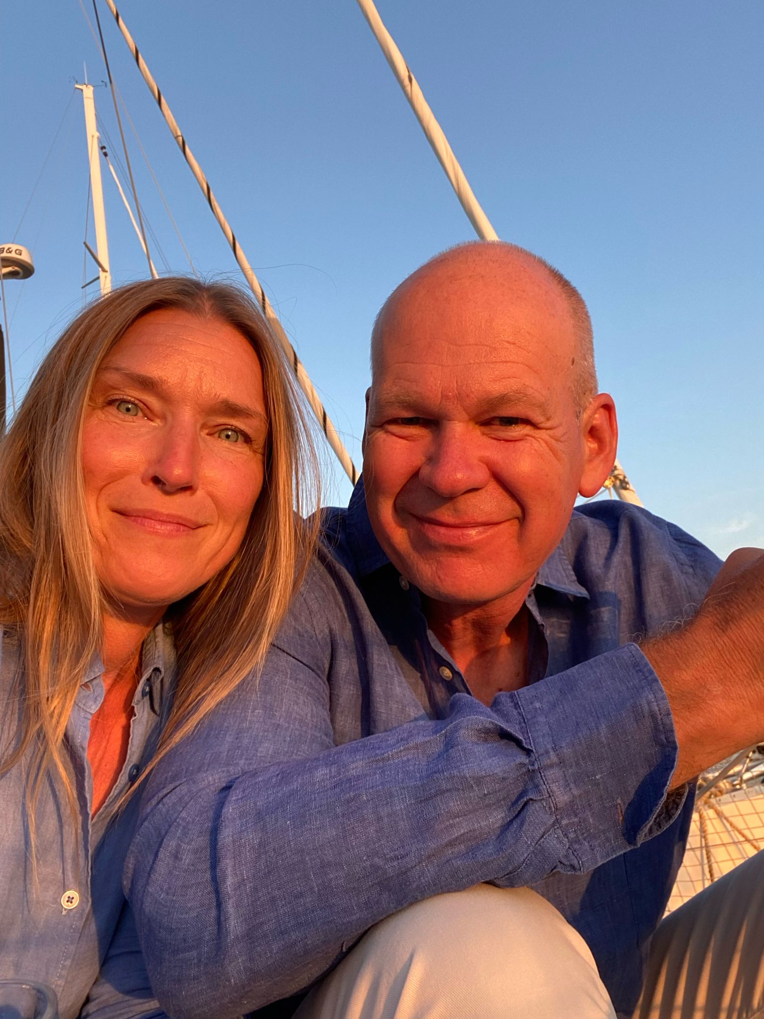 Founder sitting on a sailboat at the marina